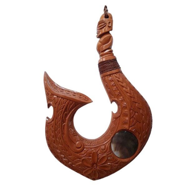 carved wooden hook w parau shell